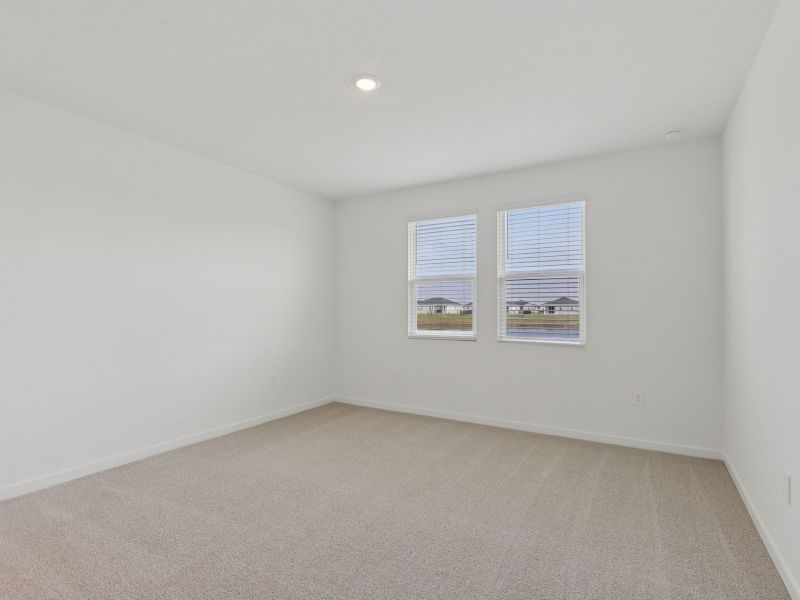 Spacious, unfurnished interior of a new home in Lakes at Bella Lago - Signature Series, Green Cove Springs (Image 12).