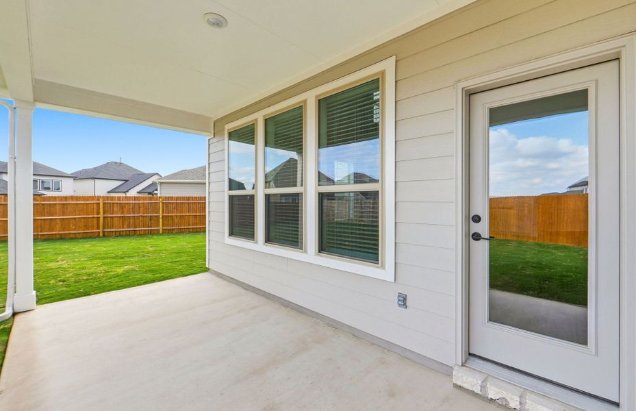 Exterior details and patio area of a home in Santa Rita Ranch, Liberty Hill (Image 3).