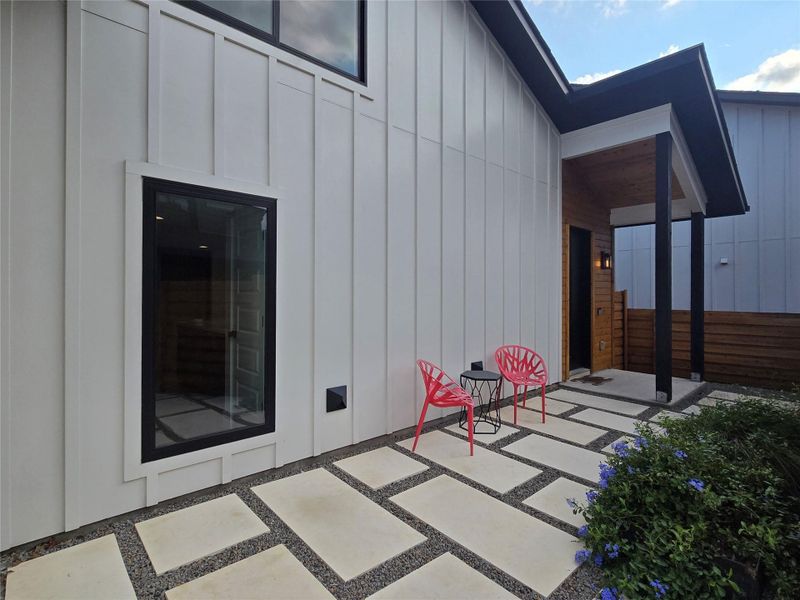 Front of the house area with large paver stones to use as you wish - put more chairs, or whatever you wish! The LED pathway lights on the wall will provide plenty of illumination at night. Front of the house area with large paver stones to use as you wish - put more chairs, or whatever you wish! The LED pathway lights on the wall will provide plenty of illumination at night.