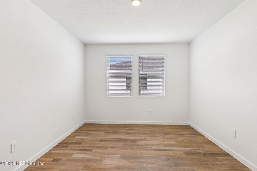 Spacious, unfurnished interior of a new home in Lakes at Bella Lago - Signature Series, Green Cove Springs (Image 23).