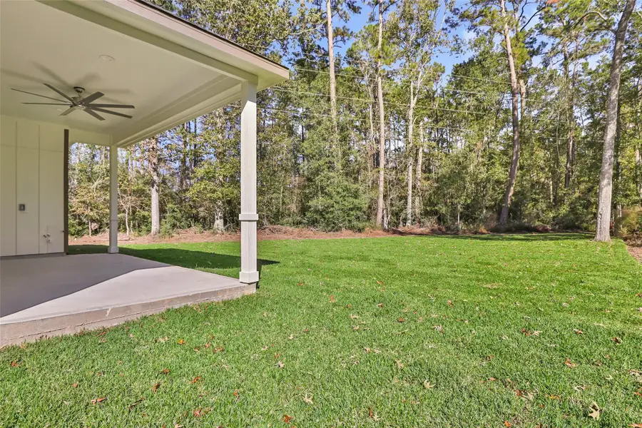 Exterior details and patio area of a home in , New Caney (Image 3).