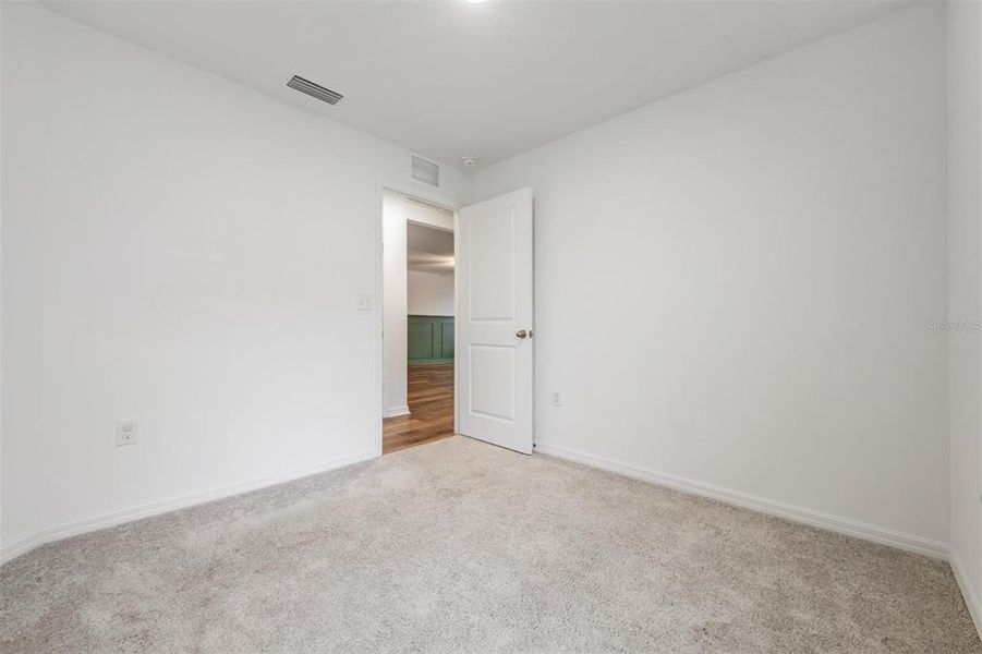 Spacious, unfurnished interior of a new home in Trilby Crossing, Brooksville (Image 24).