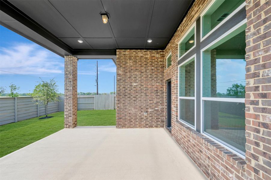 Exterior details and patio area of a home in Pomona - Reserve Collection, Manvel (Image 25). Exterior details and patio area of a home in Pomona - Reserve Collection, Manvel (Image 25).