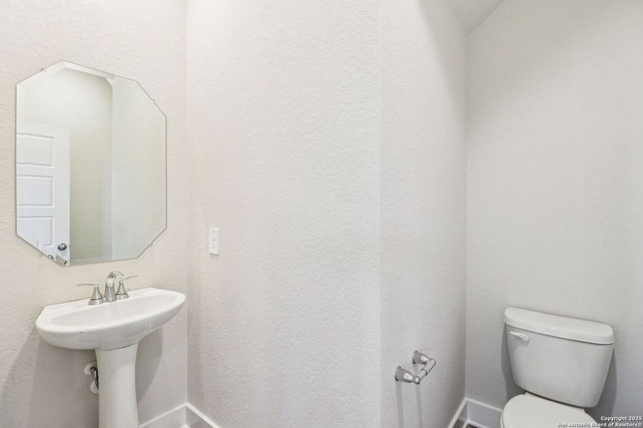 Furnished interior view inside a new home in Legendary Trails - Premier Series, Cibolo (Image 11).