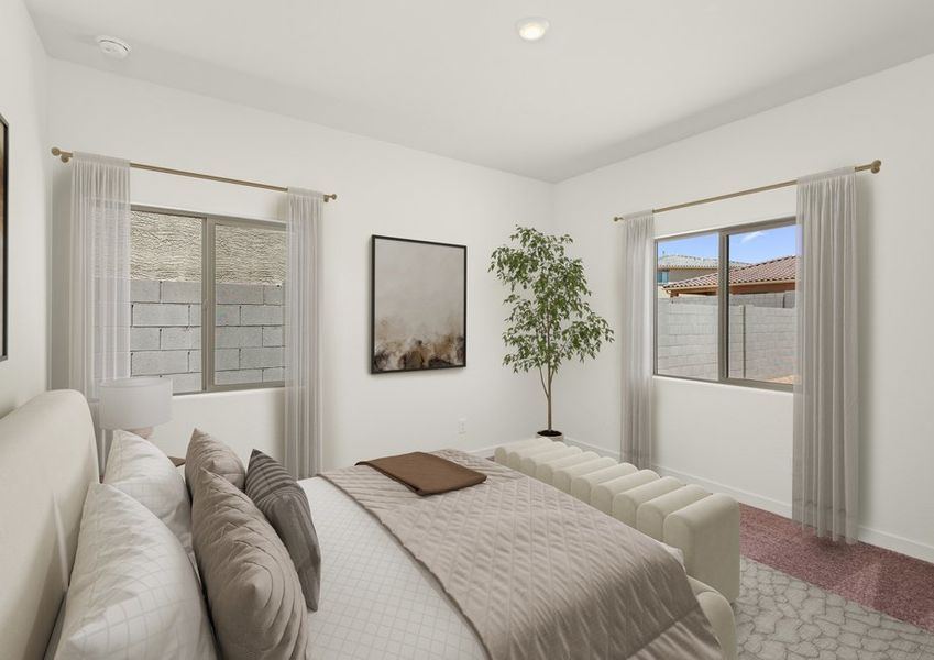 The master bedroom is filled with natural lighting creating the perfect space for relaxation.