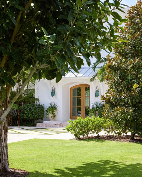Front exterior of a new home in , North Palm Beach, FL, highlighting curb appeal (Image 1). Front exterior of a new home in , North Palm Beach, FL, highlighting curb appeal (Image 1).