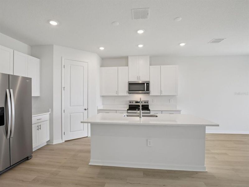 Furnished interior view inside a new home in Coasterra - Reserve Series, Palmetto (Image 15).