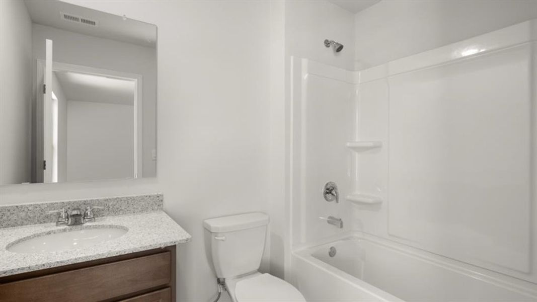 Furnished interior view inside a new home in Fairway 17 at Mirror Lake, Villa Rica (Image 6).