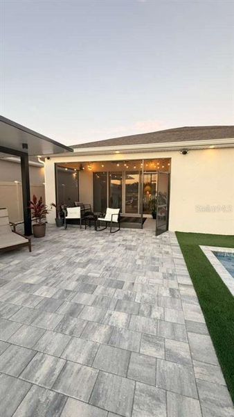 Exterior details and patio area of a home in Seasons at Big Sky, Kissimmee (Image 4).
