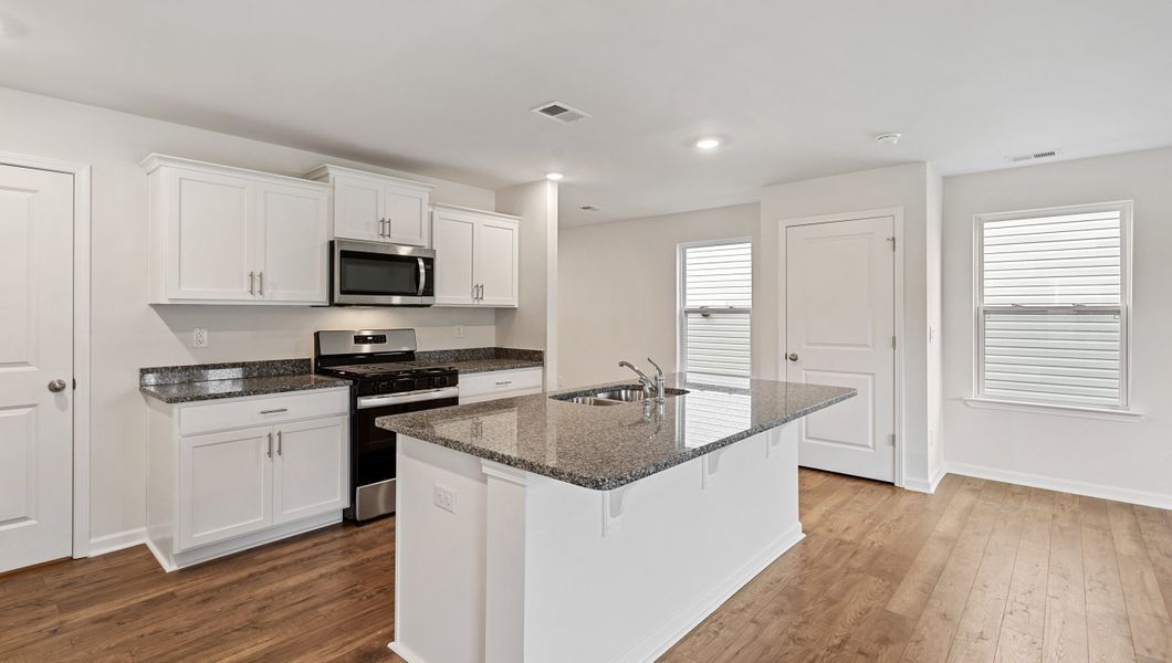 Representative furnished interior of a home built from the Elston by D.R. Horton in Varner Station, Woodruff (Image 7).