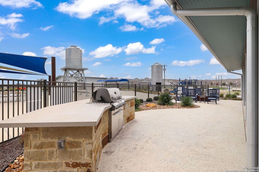 Exterior details and patio area of a home in Silos: Cottage, San Antonio (Image 2). Exterior details and patio area of a home in Silos: Cottage, San Antonio (Image 2).