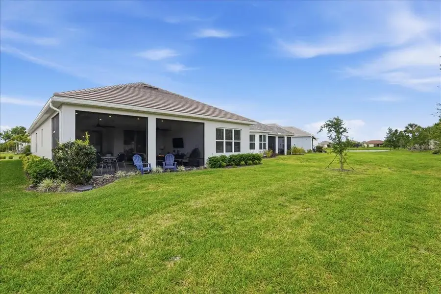 Exterior details and patio area of a home in Esplanade at Artisan Lakes, Palmetto (Image 3).