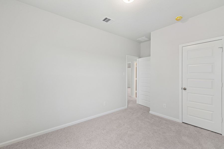 The Oriole II- Bedroom 3. Sample image to be used for example only, colors, options and upgrades vary.