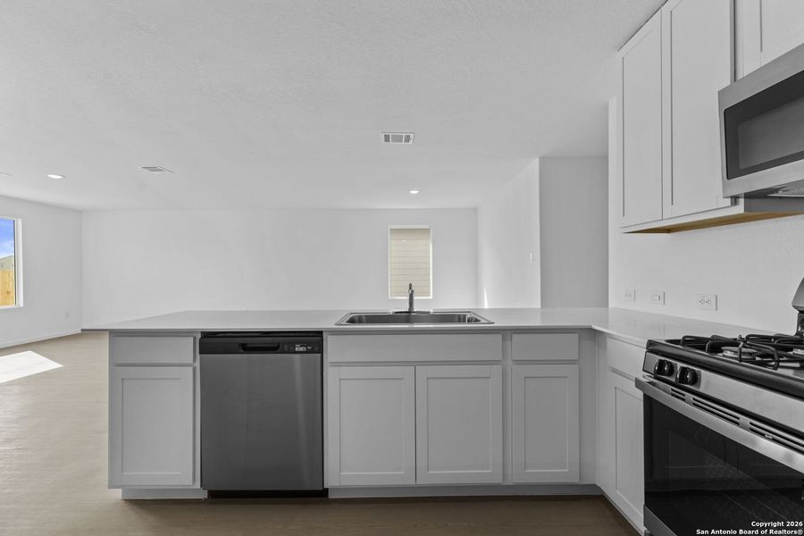 Furnished interior view inside a new home in Voss Farms, New Braunfels (Image 9).
