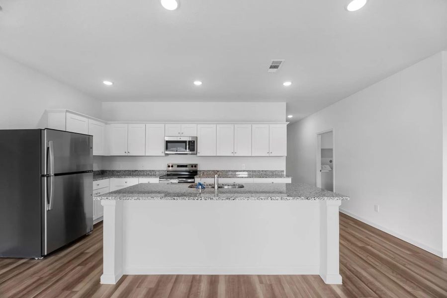 Furnished interior view inside a new home in Royal Pines, Porter (Image 3).