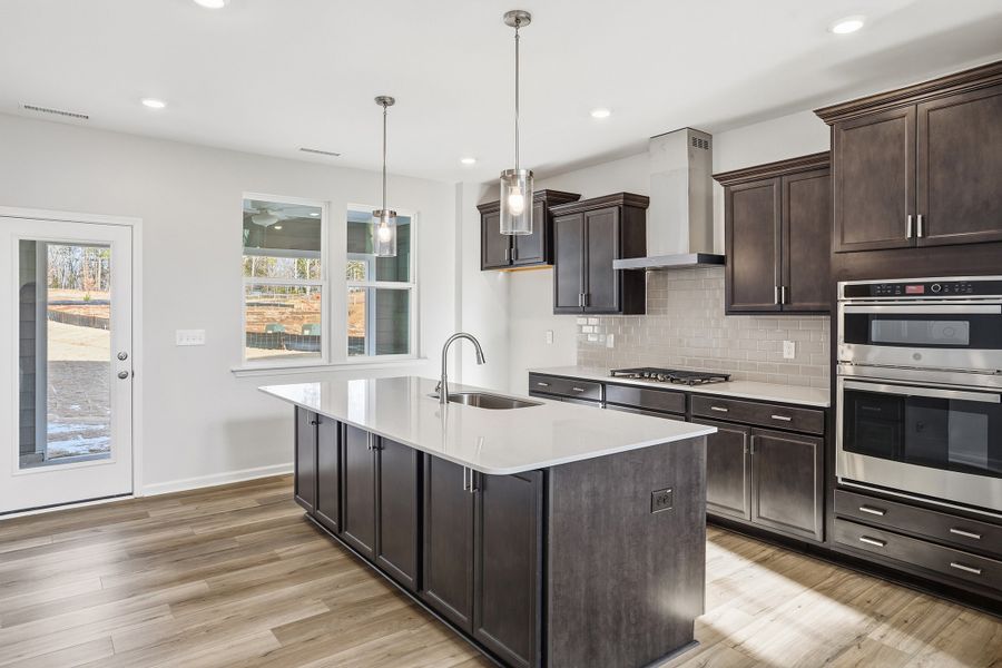 Furnished interior view inside a new home in Ovation at Sweetbrier, Durham (Image 16).