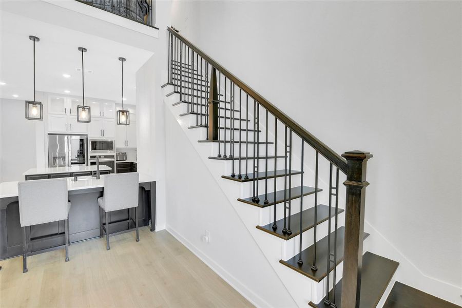 Elegant Staircase, Modern Wrought Iron Spindles