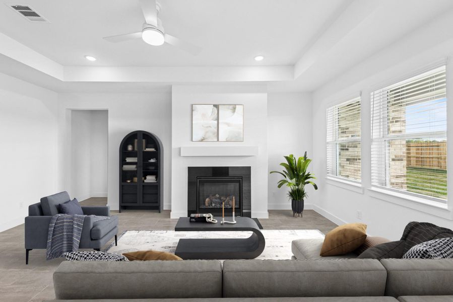 Open great room with warming fireplace