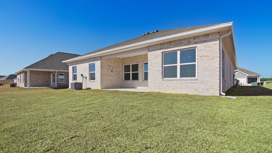 Exterior details and patio area of a home in Owl's Head Farms, Freeport (Image 4).