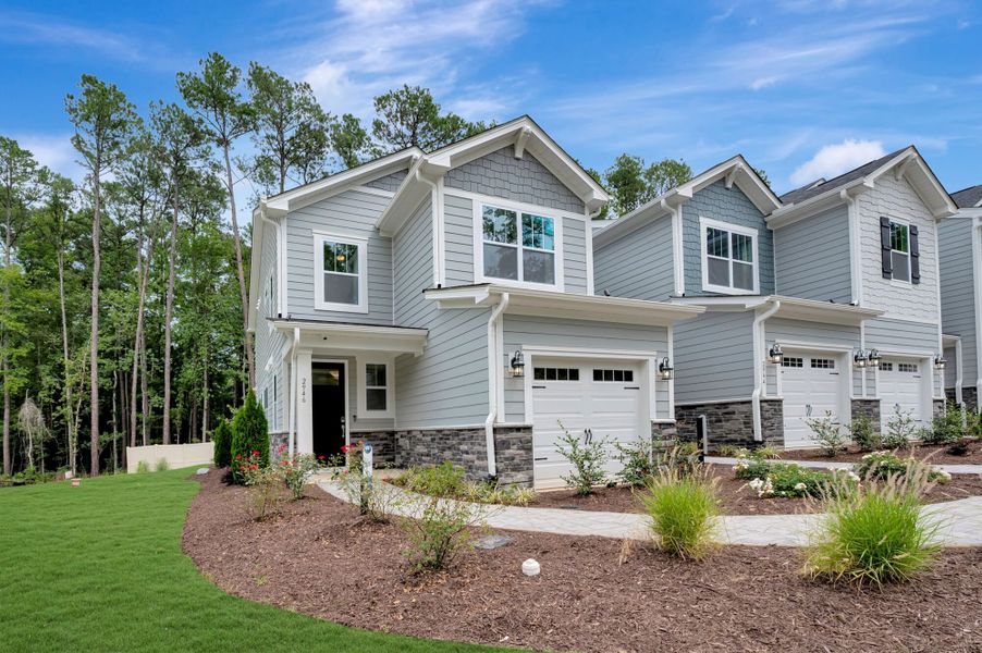 Representative exterior photo of a completed home built from the Valencia II by Mattamy Homes in Ashmore Townes, Garner, NC (Image 24). Representative exterior photo of a completed home built from the Valencia II by Mattamy Homes in Ashmore Townes, Garner, NC (Image 24).
