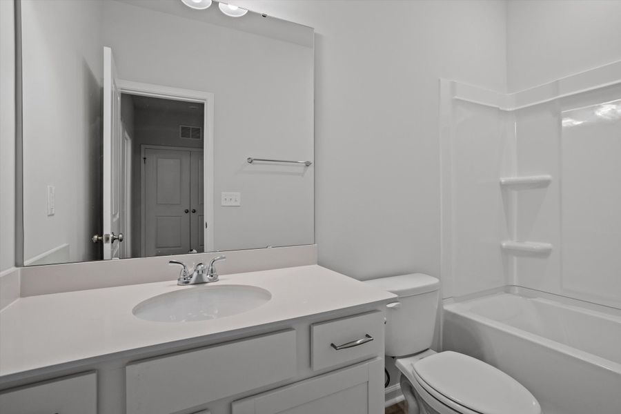 Furnished interior view inside a new home in West Main Townhomes, Sanford (Image 11).