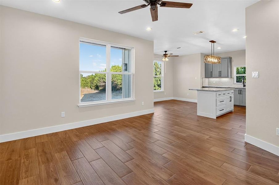 kitchen and dining open to the living area