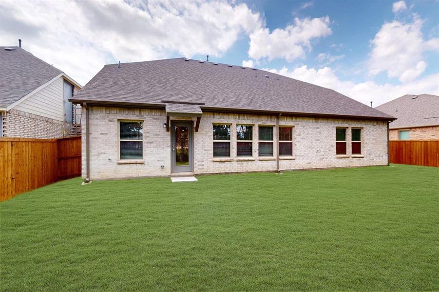 Front exterior of a new home in The Preserve, Justin, TX, highlighting curb appeal (Image 19).