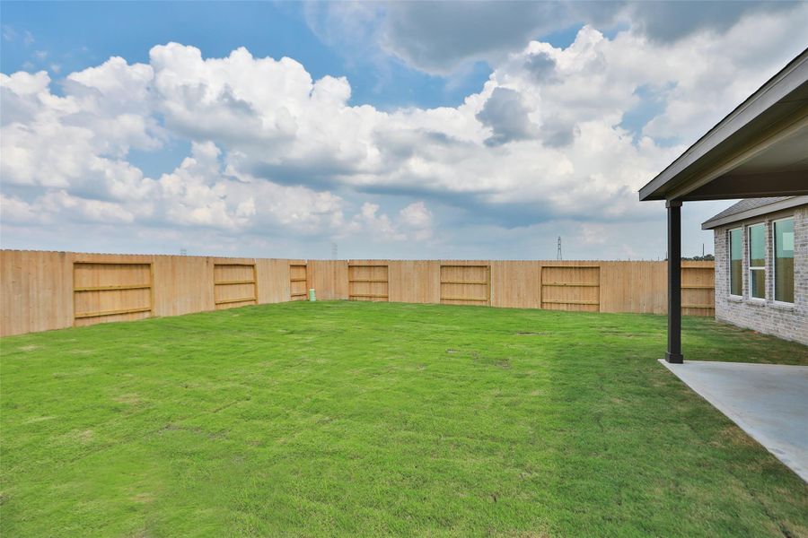 Exterior details and patio area of a home in Creekhaven, Iowa Colony (Image 3). Exterior details and patio area of a home in Creekhaven, Iowa Colony (Image 3).