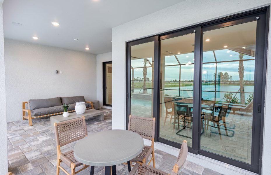 Exterior details and patio area of a home in Arbor Oaks, North Port (Image 3).
