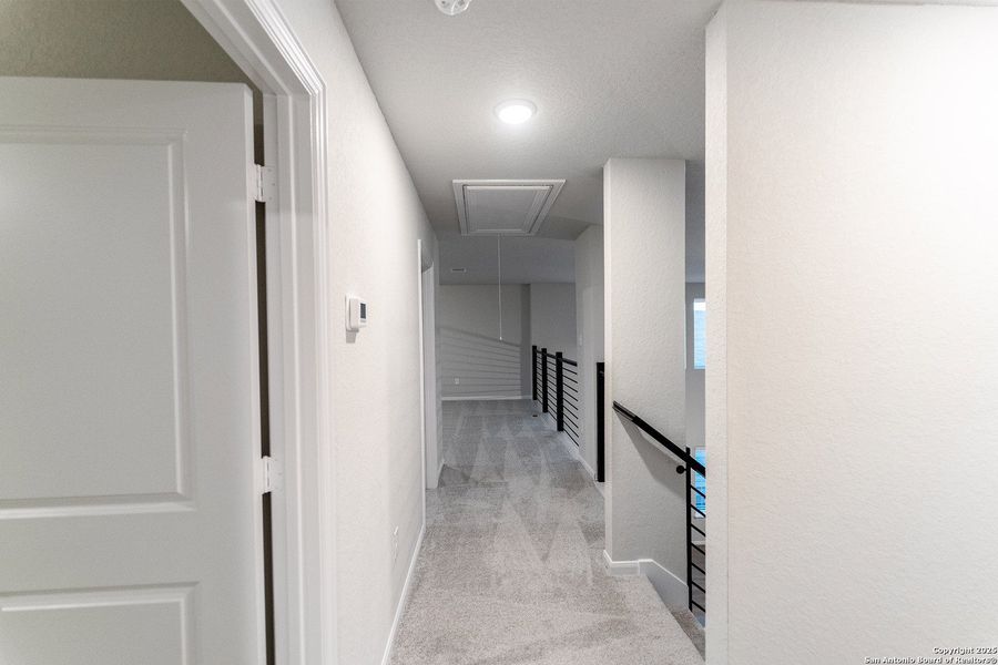 Spacious, unfurnished interior of a new home in Hennersby Hollow, San Antonio (Image 17).