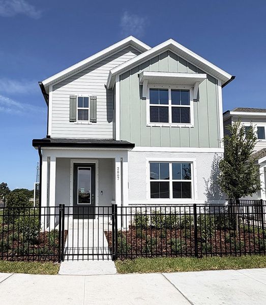 Representative exterior photo of a completed home built from the The Mccormick by David Weekley Homes in Soleta at Starkey Ranch - Cottage Series, Odessa, FL (Image 2). Representative exterior photo of a completed home built from the The Mccormick by David Weekley Homes in Soleta at Starkey Ranch - Cottage Series, Odessa, FL (Image 2).