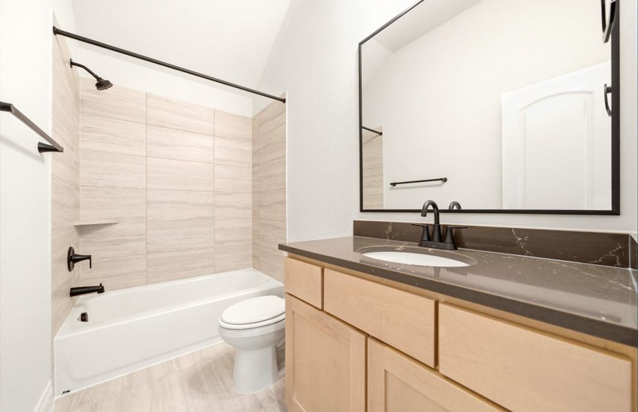 Furnished interior view inside a new home in Bridgeland 60′, Cypress (Image 9).