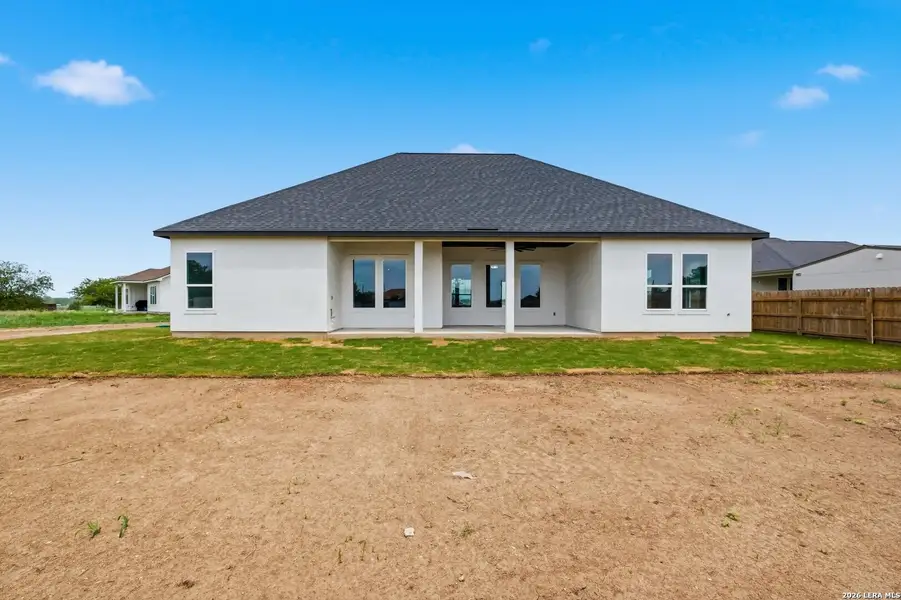 Exterior details and patio area of a home in , Castroville (Image 4).