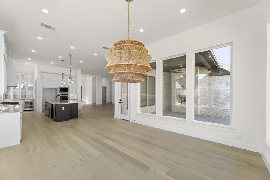Representative unfurnished interior of a home built from the 5551 by Tradition Homes in Windsong Ranch, Prosper (Image 25).