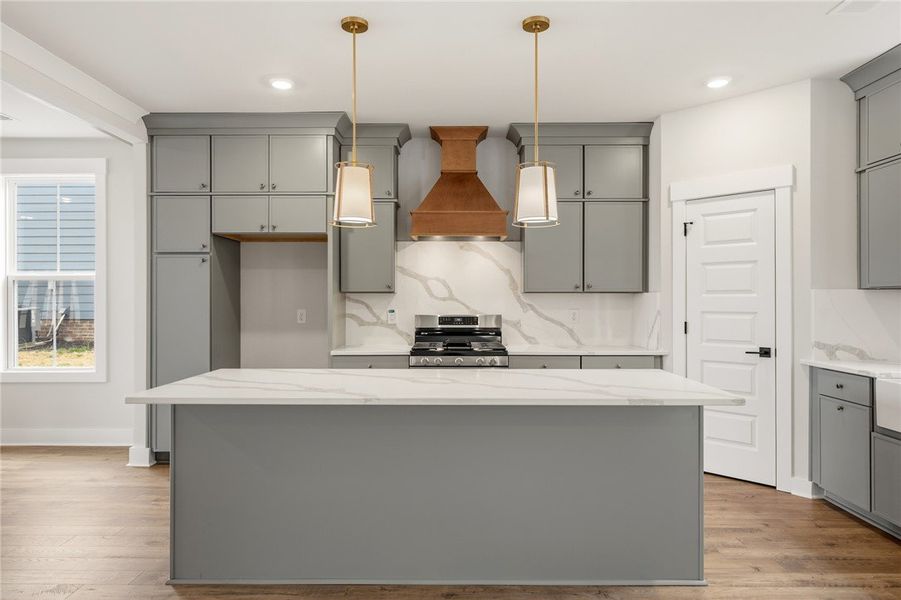 This contemporary kitchen features an inviting isl