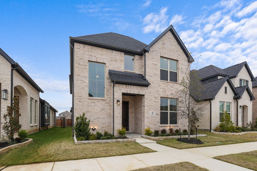 Front exterior of a new home in Cottages of Celina, Celina, TX, highlighting curb appeal (Image 22). Front exterior of a new home in Cottages of Celina, Celina, TX, highlighting curb appeal (Image 22).