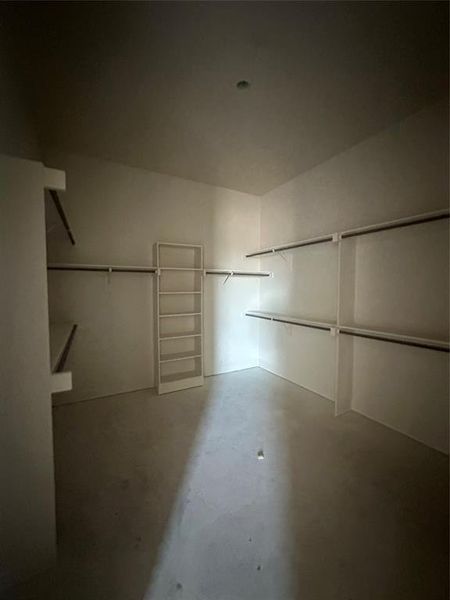 Utility room conveniently connects to primary closet