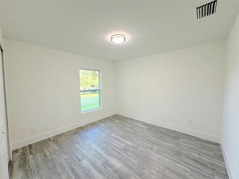 Spacious, unfurnished interior of a new home in , Okeechobee (Image 28).