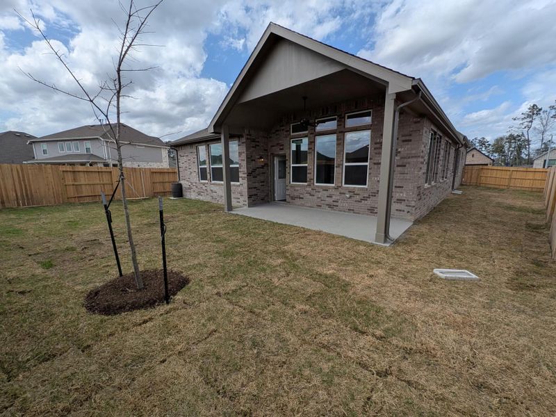 Exterior details and patio area of a home in Artavia, Conroe (Image 4).