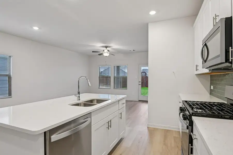 Photo is not of the actual home, but is an inspirational photo of builder’s model home and may depict options, furnishings, and/or decorator features that are not included.