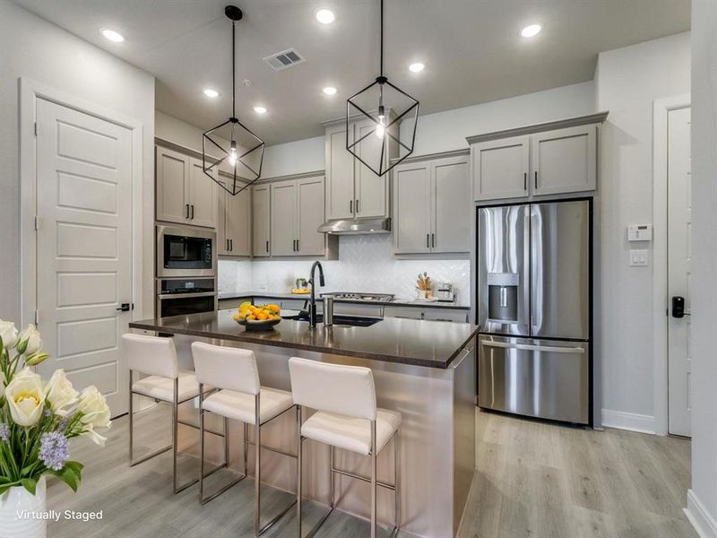 Furnished interior view inside a new home in Hillside at Las Colinas, Irving (Image 3). Furnished interior view inside a new home in Hillside at Las Colinas, Irving (Image 3).