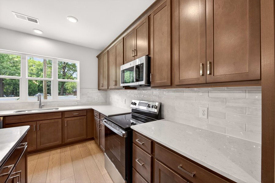Furnished interior view inside a new home in Amplitude, Charlotte (Image 9).