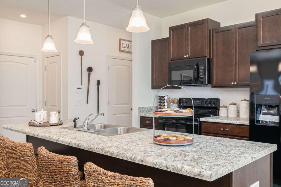 Furnished interior view inside a new home in Maddox Station, Eatonton (Image 9).