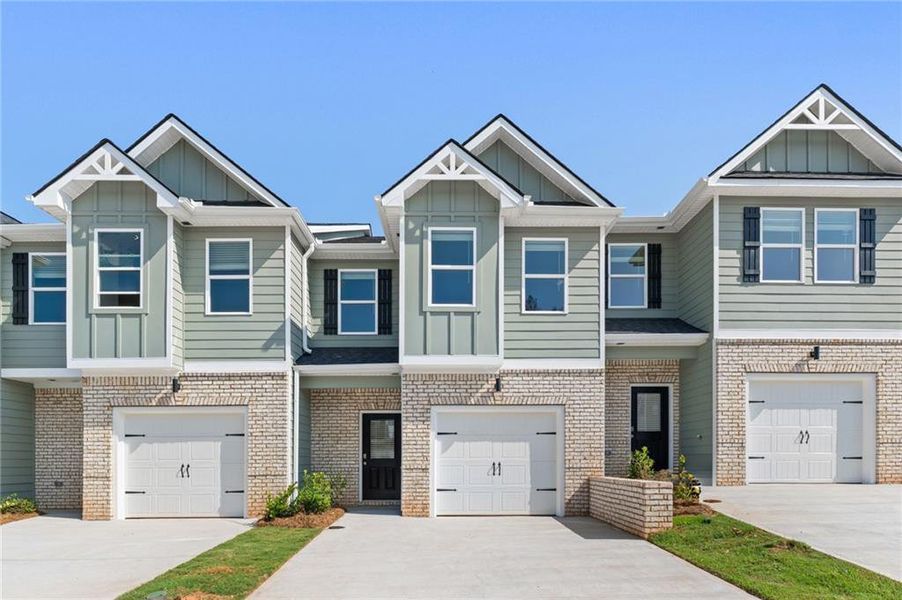 Front exterior of a new home in Carolina, Palmetto, GA, highlighting curb appeal (Image 1). Front exterior of a new home in Carolina, Palmetto, GA, highlighting curb appeal (Image 1).