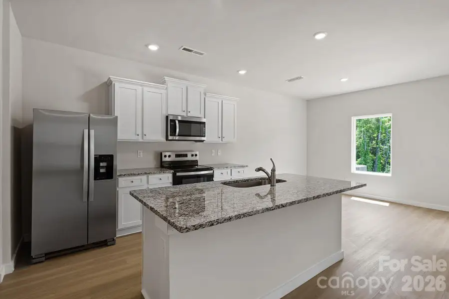 Furnished interior view inside a new home in Knights Bridge, Richburg (Image 6).