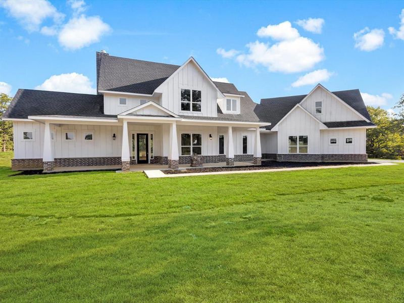 Front exterior of a new home in , Sunset, TX, highlighting curb appeal (Image 1). Front exterior of a new home in , Sunset, TX, highlighting curb appeal (Image 1).
