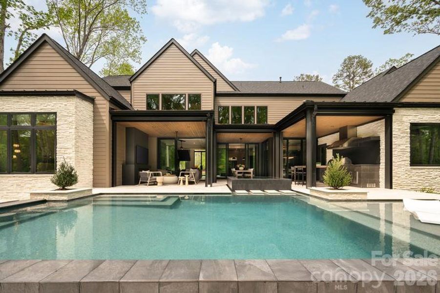 Exterior details and patio area of a home in , Belmont (Image 3).