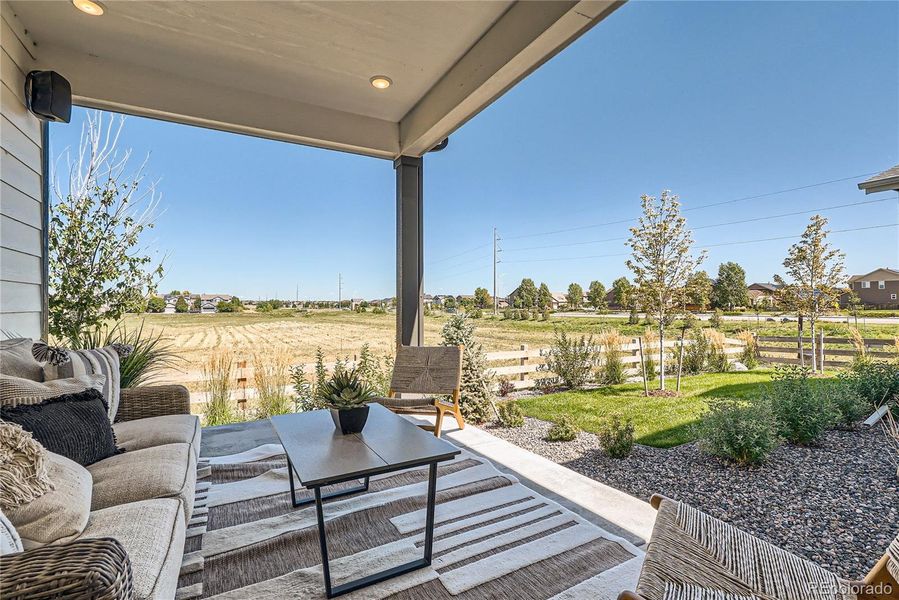 Covered patio backing to open space