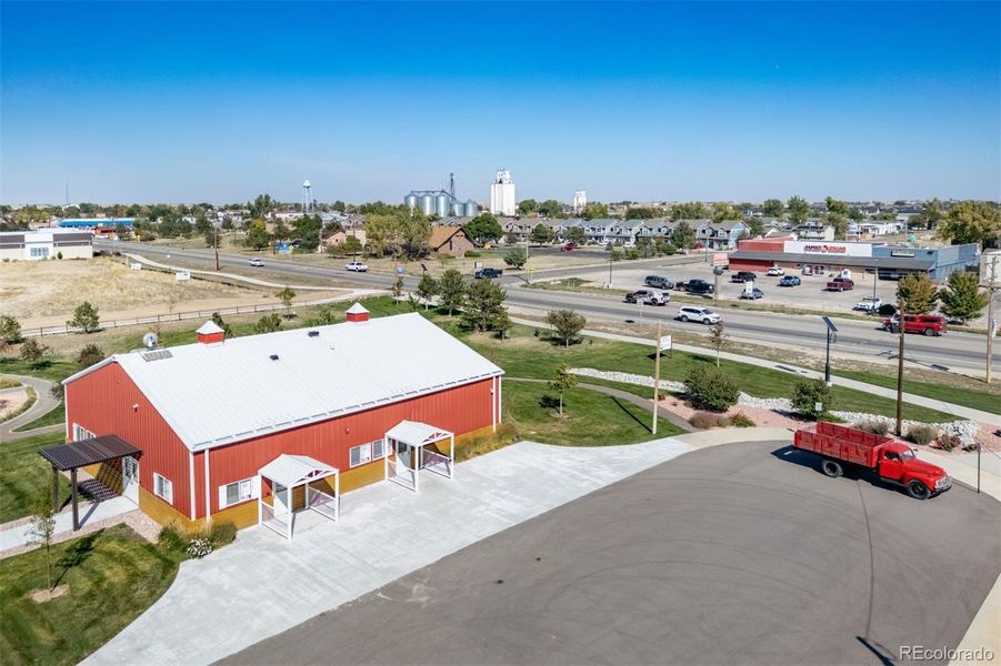 Front exterior of a new home in Muegge Farms, Bennett, CO, highlighting curb appeal (Image 22). Front exterior of a new home in Muegge Farms, Bennett, CO, highlighting curb appeal (Image 22).