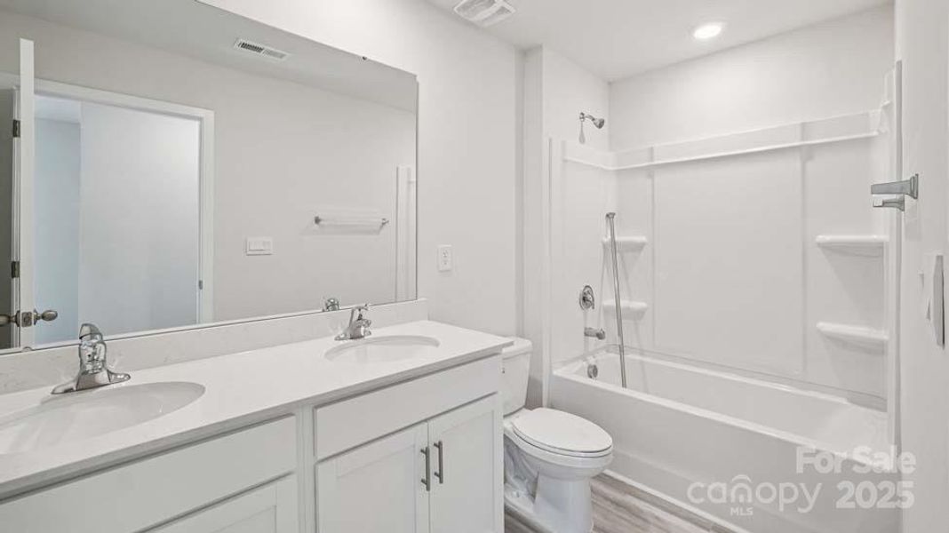 Furnished interior view inside a new home in Cardinal Creek, Charlotte (Image 3).